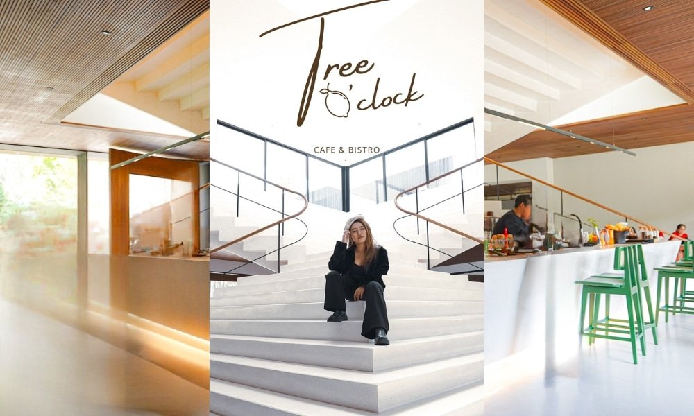 การตกแต่งภายในร้านกาแฟสไตล์โมเดิร์นที่ "Tree O'clock" ด้วยดีไซน์สว่างสดใสสไตล์มินิมอล มีบันได สถานที่ท่องเที่ยวในภูเก็ต กลาง เพดานไม้ และเก้าอี้บาร์สีเขียวที่เคาน์เตอร์ซึ่งมีคนนั่ง ที่ที่นักเดินทางต้องไม่พลาดในหมู่ภูเก็ต